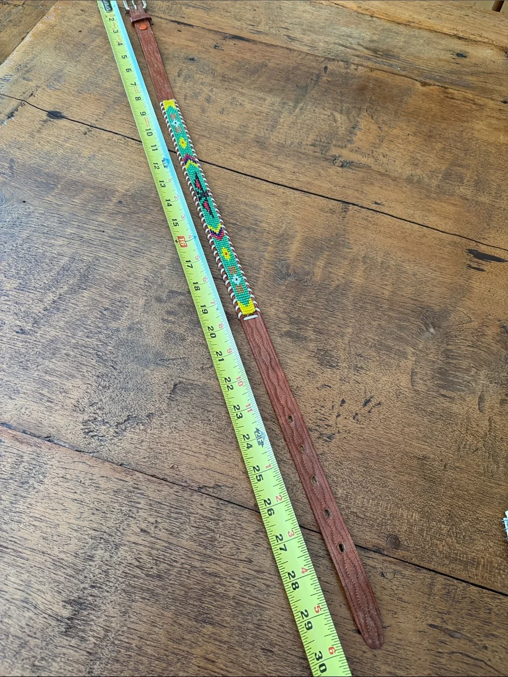 Child’s souvenir beaded belt with brown leather